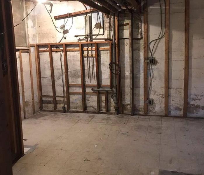 demolition in a basement after mold